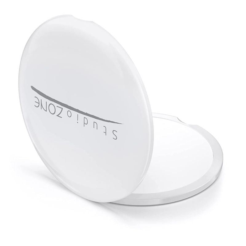 The ClassZ White Compact Mirror is perfect for purses and travel. 
